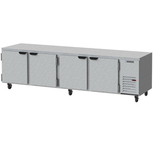 A grey Beverage-Air undercounter refrigerator with three doors and two drawers.