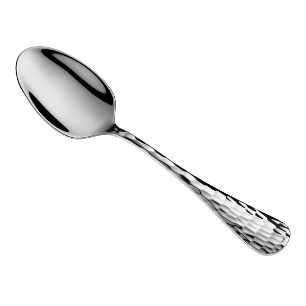 A shiny metal spoon with a hammered texture on the handle, shown on a white background.
