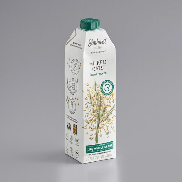 A white carton of Elmhurst Milked Oats with a label.