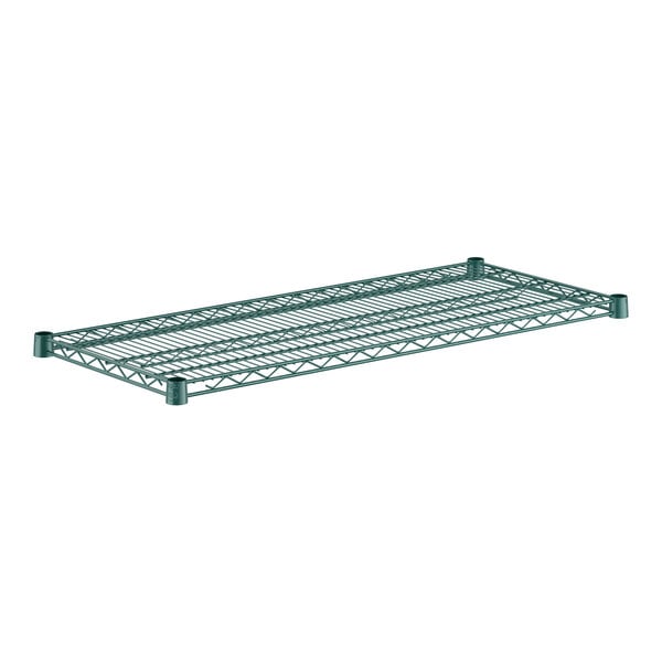 A Regency green metal wire shelf.