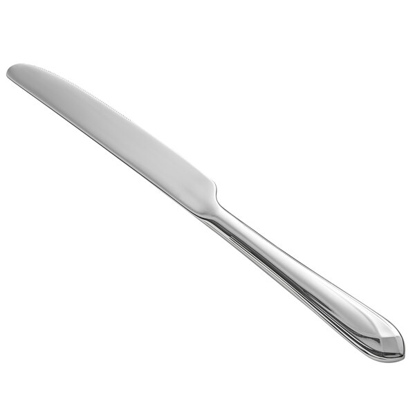 A WMF by BauscherHepp stainless steel table knife with a white background.