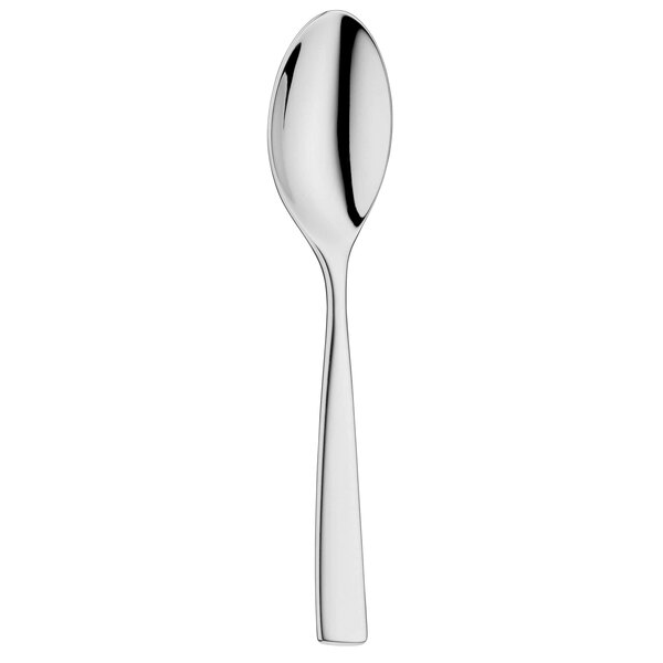 A close-up of a WMF by BauscherHepp stainless steel spoon with a silver handle.