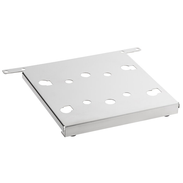 A metal plate with holes for Edlund burger presses.