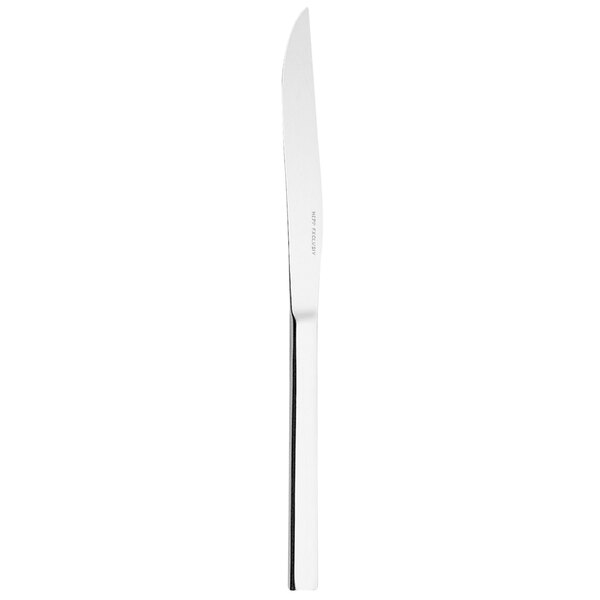A Hepp by Bauscher steak knife with a white handle.