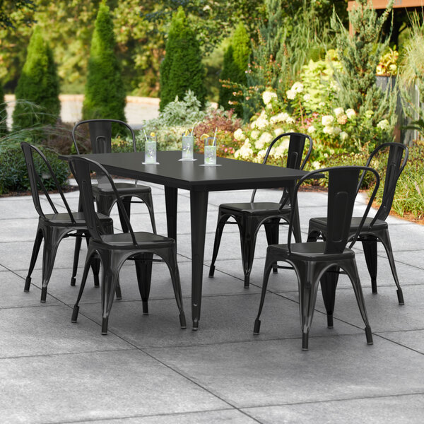 Lancaster Table & Seating Alloy Series 63" x 32" Black Dining Height Outdoor Table with 6 Industrial Cafe Chairs