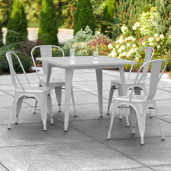 Lancaster Table & Seating Alloy Series 36" x 36" Silver Dining Height Outdoor Table with 4 Industrial Cafe Chairs
