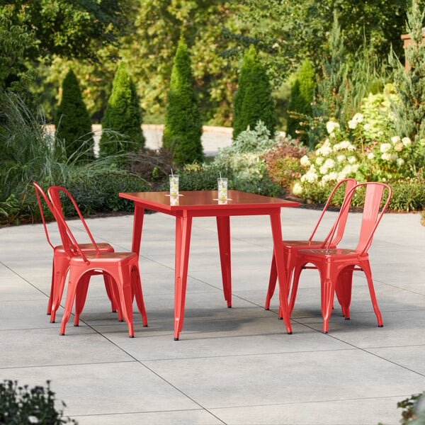 Lancaster Table & Seating Alloy Series 47 1/2" x 29 1/2" Ruby Red Standard Height Outdoor Table with 4 Cafe Chairs