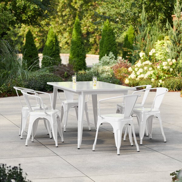 Lancaster Table & Seating Alloy Series 63" x 31 1/2" White Standard Height Outdoor Table with 6 Arm Chairs
