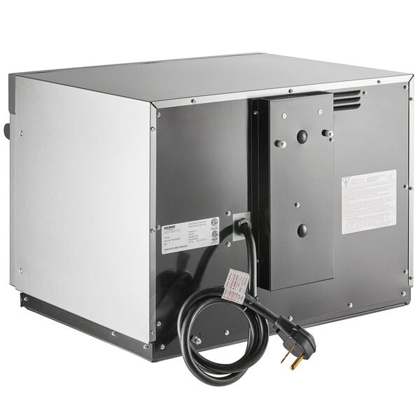 A black and silver box with a power cord.