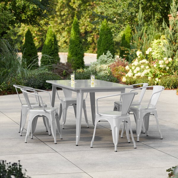 Lancaster Table & Seating Alloy Series 63" x 31 1/2" Silver Standard Height Outdoor Table with 6 Arm Chairs