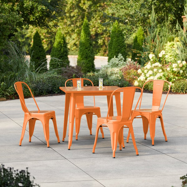 Lancaster Table & Seating Alloy Series 31 1/2" x 31 1/2" Amber Orange Standard Height Outdoor Table with 4 Cafe Chairs