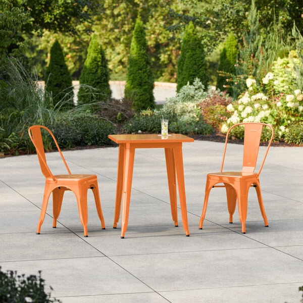 Lancaster Table & Seating Alloy Series 23 1/2" x 23 1/2" Amber Orange Standard Height Outdoor Table with 2 Cafe Chairs