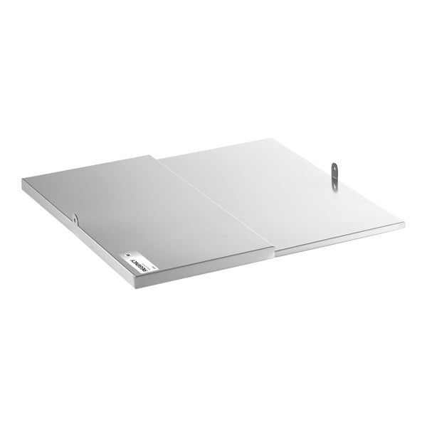A rectangular, metallic sliding lid with a small label, a padlock, and two keys placed on a white background.