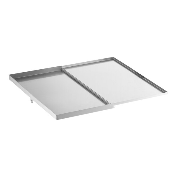 A rectangular metal sliding lid with two sections, featuring raised edges and a smooth reflective surface.