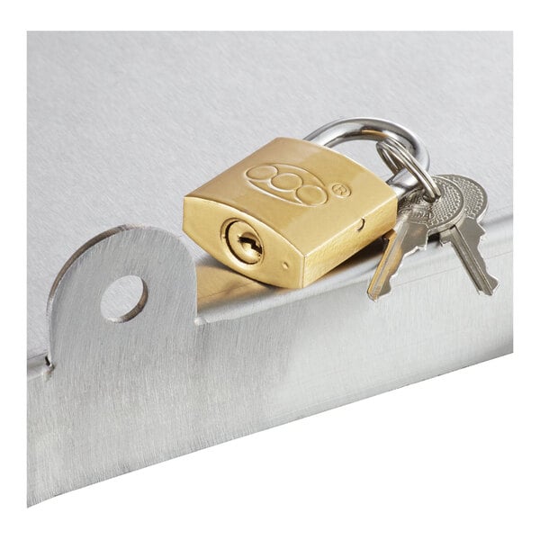 A brass padlock with two keys is attached to a metal sliding lid.