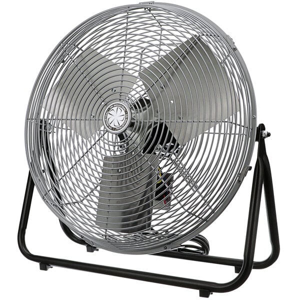 A TPI industrial floor fan with a metal stand and grill on a white background.