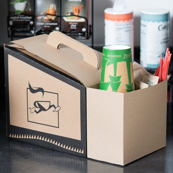 A Sabert take out container service caddy holding a white coffee cup with a green and white label.
