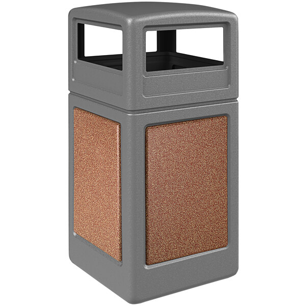 A grey rectangular Commercial Zone StoneTec trash can with brown panels and a dome lid.