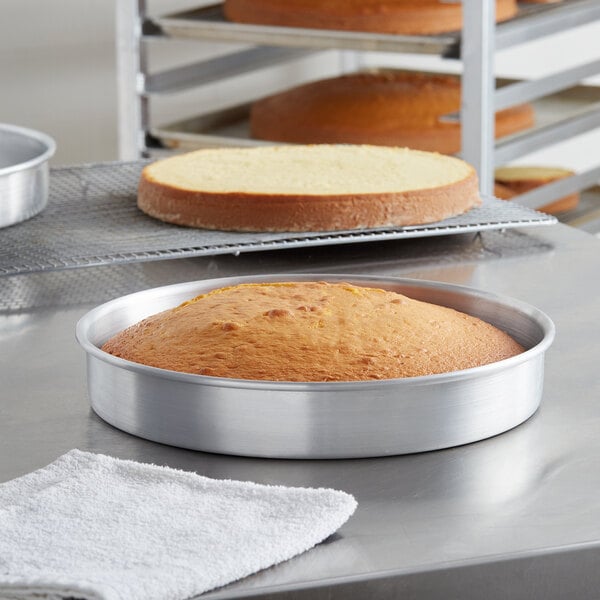 A cake baked in a Choice round aluminum cake pan.