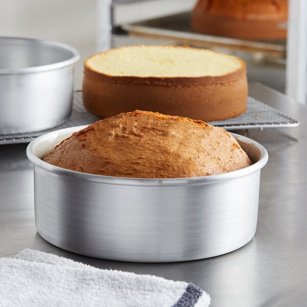 A round cake in a Choice aluminum pan.