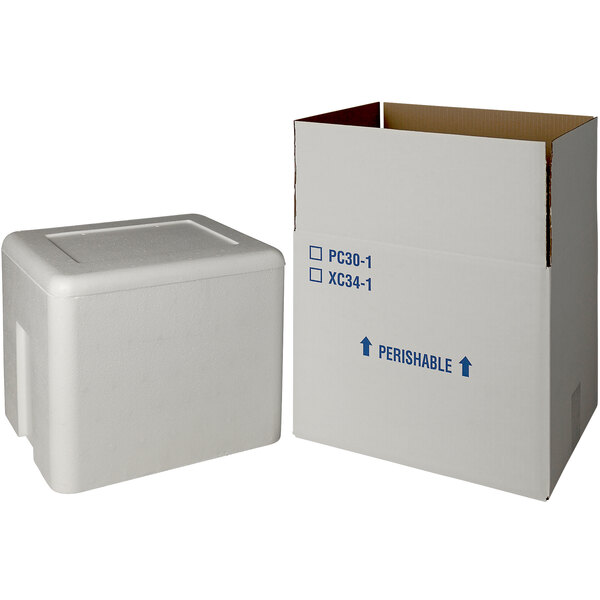 A white insulated shipping box with blue styrofoam inside.