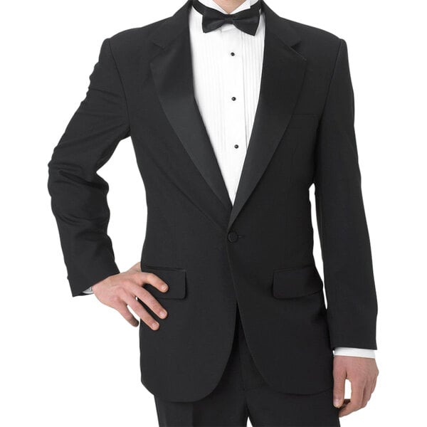 A man in a Henry Segal black tuxedo jacket posing for a photo.