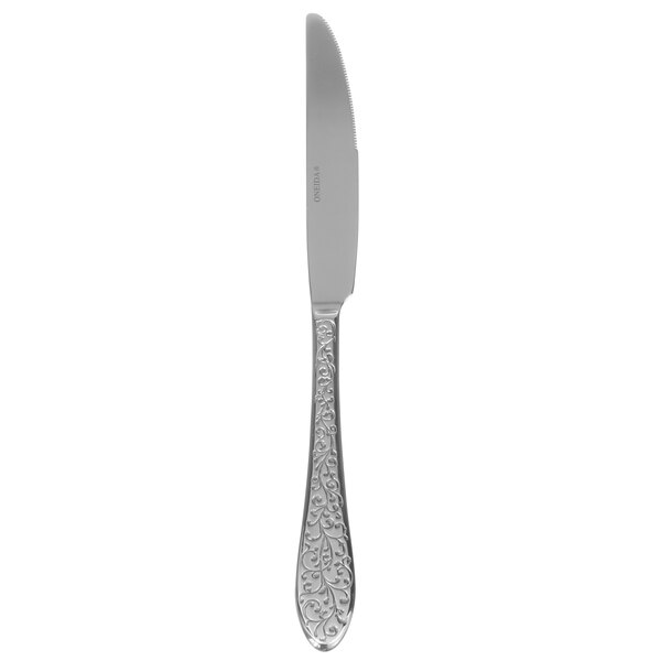 An Oneida Ivy Flourish stainless steel dessert knife with a handle featuring a design.