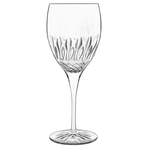 A close-up of a Luigi Bormioli Diamante Chianti wine glass with a design on it.