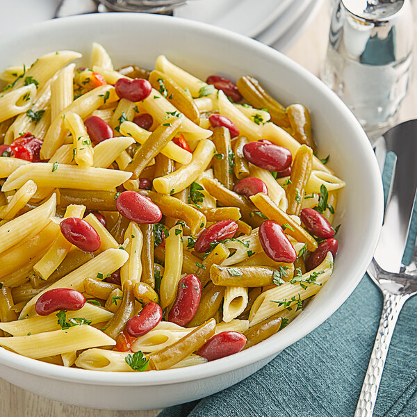 A bowl of pasta with Furmano's Three Bean Salad.