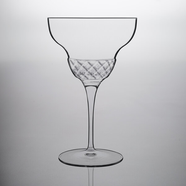 A clear Luigi Bormioli Margarita glass with a long stem and a crystal rim.