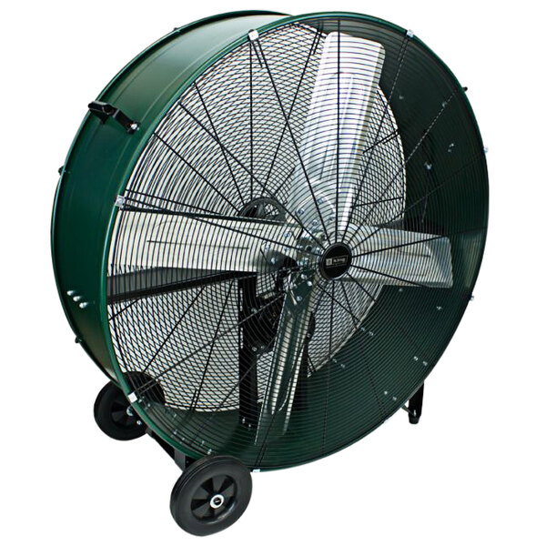 A large green King Electric industrial drum fan on wheels.