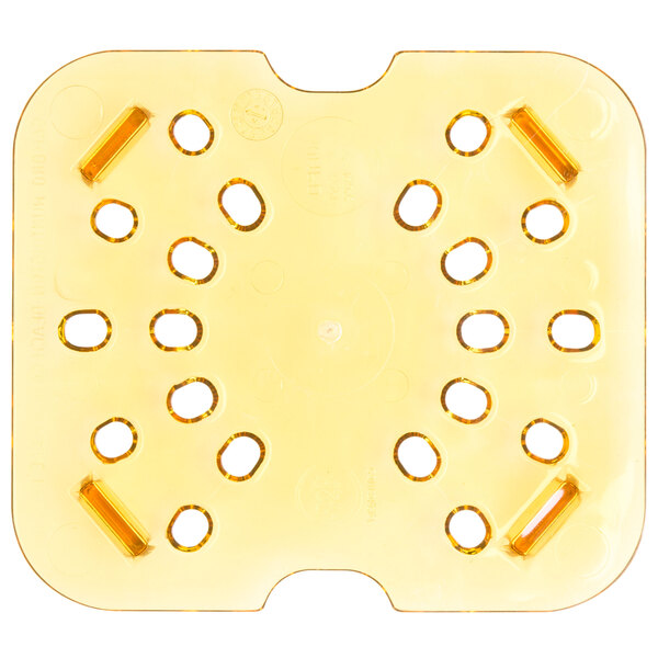 A yellow plastic plate with holes.