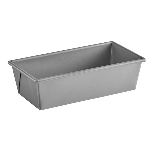A rectangular glazed aluminized steel bread loaf pan measuring 9 inches by 4 1/2 inches by 2 3/4 inches.