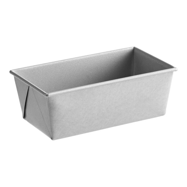 A small rectangular glazed aluminized steel bread loaf pan.