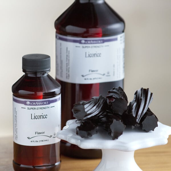 A close-up of a bottle of LorAnn Oils Licorice Super Strength Flavor on a counter.