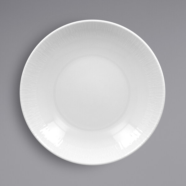 A white RAK Porcelain Soul deep coupe plate with a textured pattern.