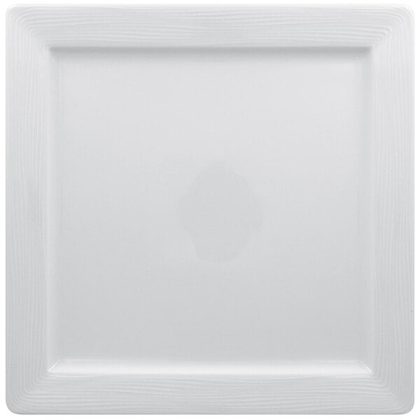 A white square RAK Porcelain plate with an embossed pattern.