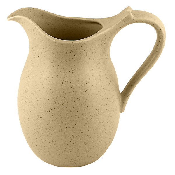 A cream colored RAK Porcelain jug with a handle.