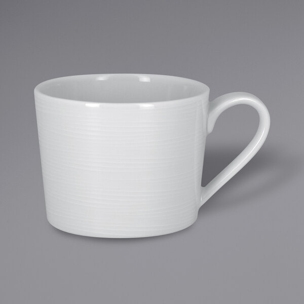 A RAK Porcelain bright white mug with a handle.