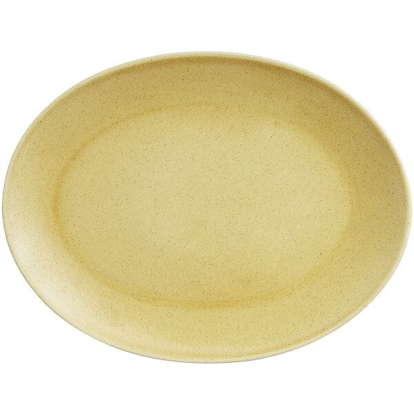 A close-up of a beige oval porcelain platter with a glossy finish.