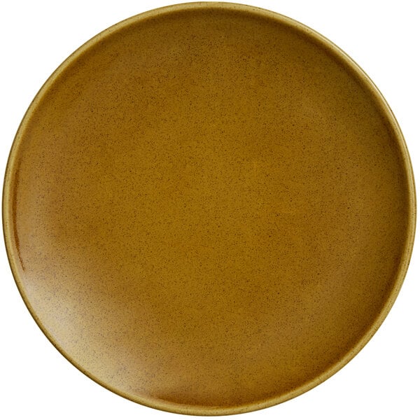 A close up of a brown RAK Porcelain Genesis flat coupe plate with a brown rim.