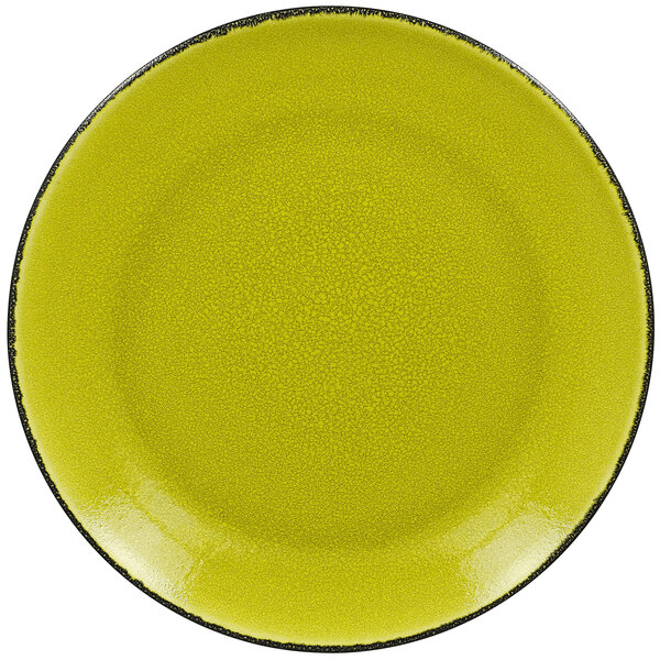 A lime green RAK Porcelain coupe plate with a black rim.