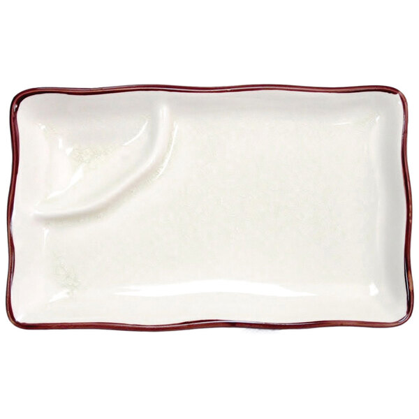 A white rectangular plate with a red border.