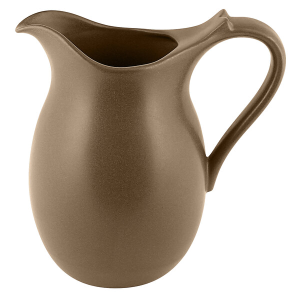 A brown RAK Porcelain Genesis jug with a handle.
