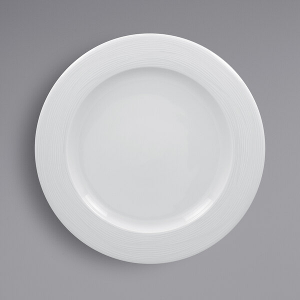A RAK Porcelain white plate with a circular rim.