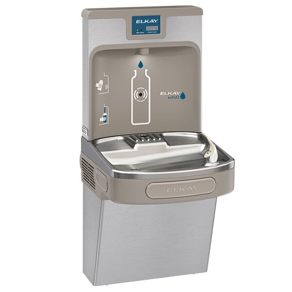 An Elkay stainless steel water fountain with a water bottle on it.