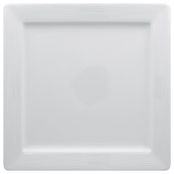 A white square RAK Porcelain plate with an embossed square design.