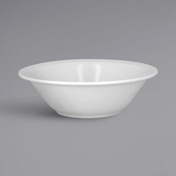 A close up of a RAK Porcelain Charm bright white embossed cereal bowl.
