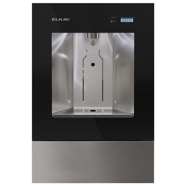 A white rectangular Elkay water bottle filling station with a black circle on a black and grey surface.