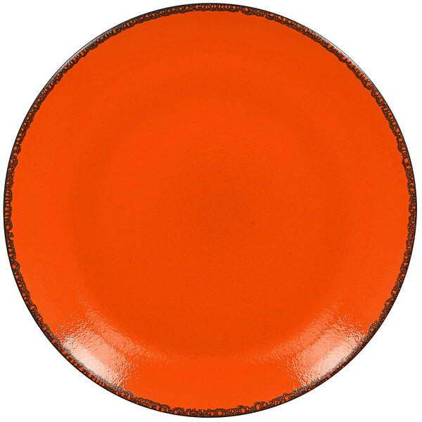 A white porcelain coupe plate with an orange border.